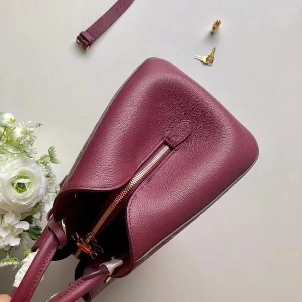 Monogram Empreinte Leather Montaigne Mm Bag M43258 Raisin